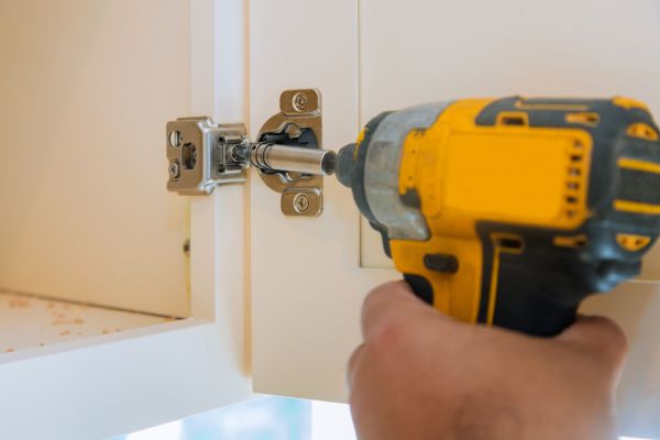 Cupboard Door Hinge Repair in Red Oak